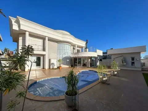 Sobrado com 4 dormitórios à venda, 429 m² por R$ 5.400.000,00 - Condomínio Residencial Treviso - Cascavel/PR