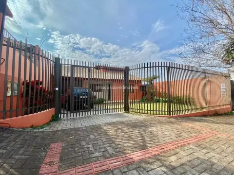 Terreno com 2 benfeitorias no Centro