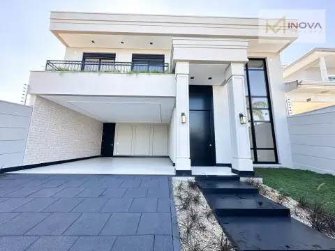 Sobrado neoclássico com 4 suítes à venda, 403 m² por R$ 3.100.000 - Região do Lago 2 - Cascavel/PR