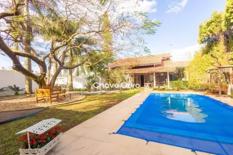 Casa com 5 quartos, 350 m², à venda por R$ 4.700.000 - Neva - Cascavel/PR